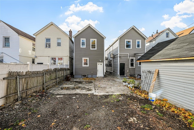 back of property featuring a patio area