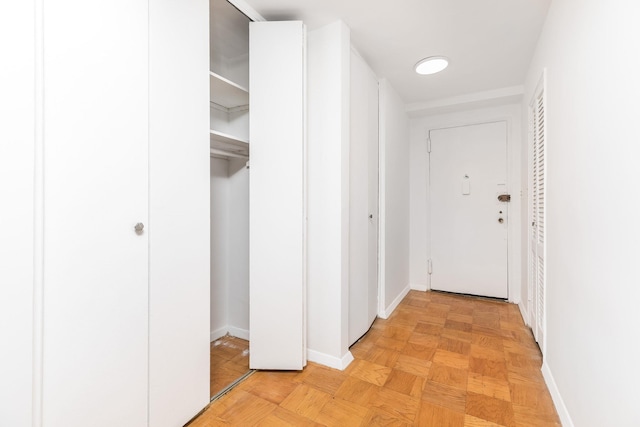 hall featuring light parquet flooring