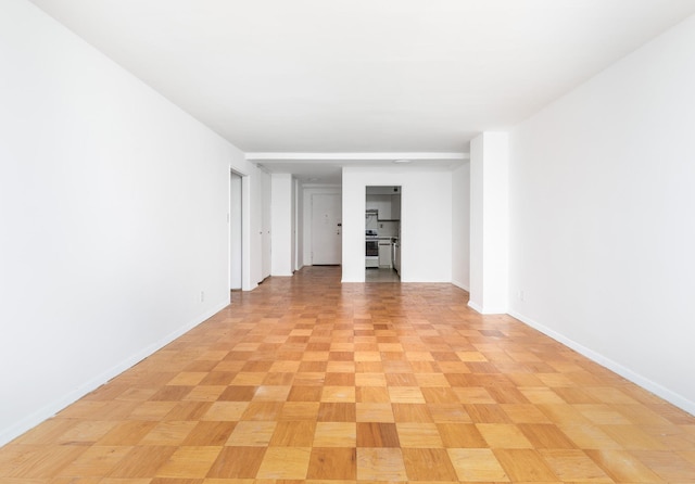 spare room with light parquet flooring