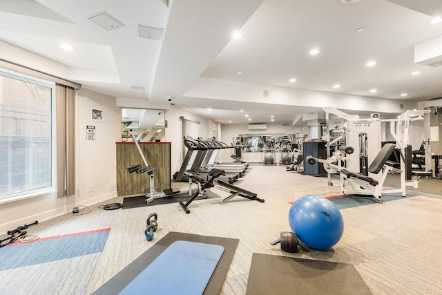 40 Brighton 1st Rd Unit 3J, Brooklyn, NY 11235 - workout area featuring recessed lighting, carpet, a wall mounted air conditioner, and baseboards