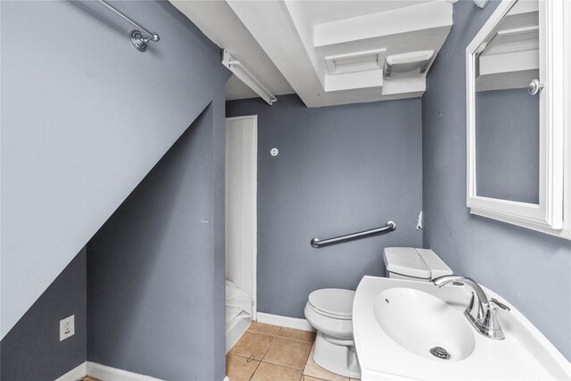 bathroom with tile patterned floors, a shower, toilet, and sink