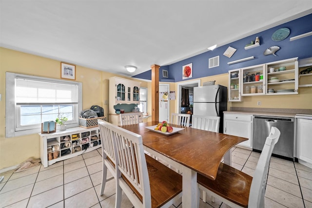 dining room with light tile patterned floors