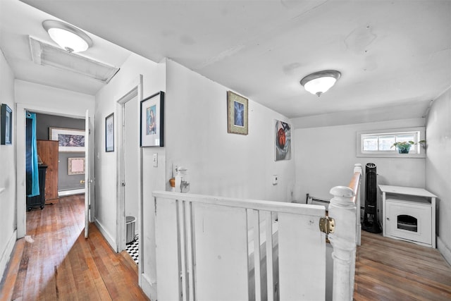 hall with dark wood-type flooring