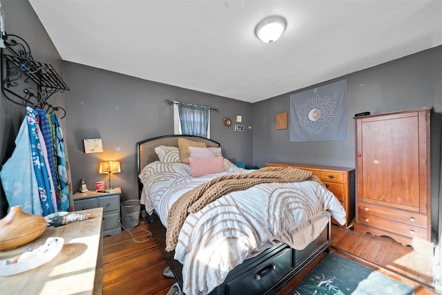 bedroom featuring dark hardwood / wood-style floors