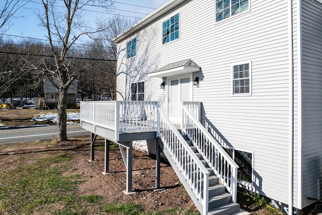 rear view of property with a deck