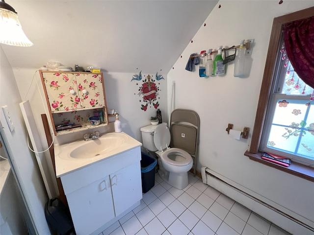 bathroom with vanity, a baseboard heating unit, vaulted ceiling, tile patterned flooring, and toilet