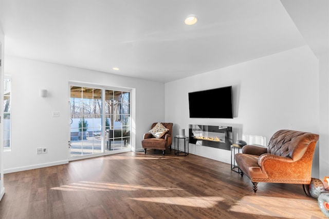 sitting room featuring hardwood / wood-style flooring