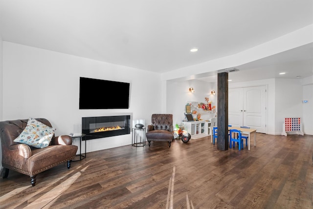 living room featuring dark hardwood / wood-style flooring