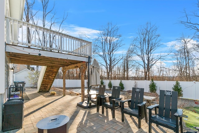 view of patio / terrace featuring a wooden deck