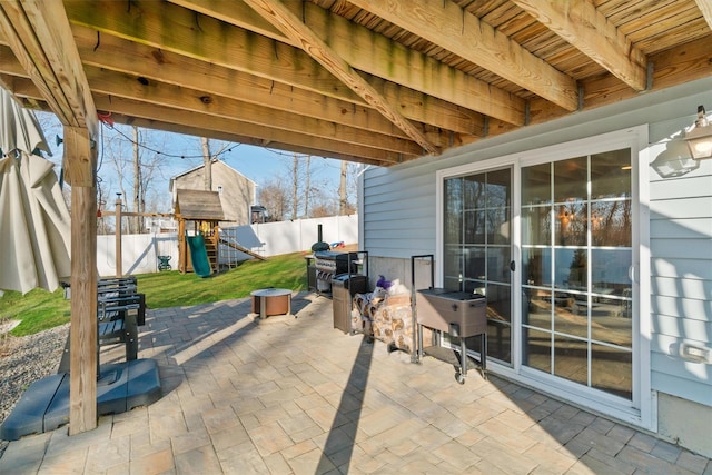 view of patio featuring a playground