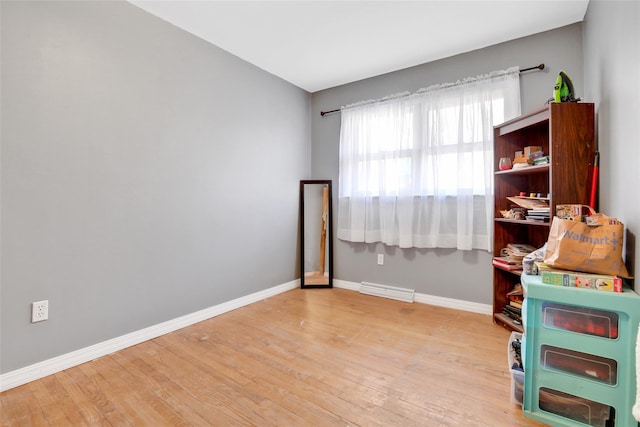 recreation room with light hardwood / wood-style flooring