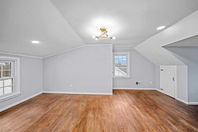 bonus room with visible vents, recessed lighting, wood finished floors, lofted ceiling, and baseboards