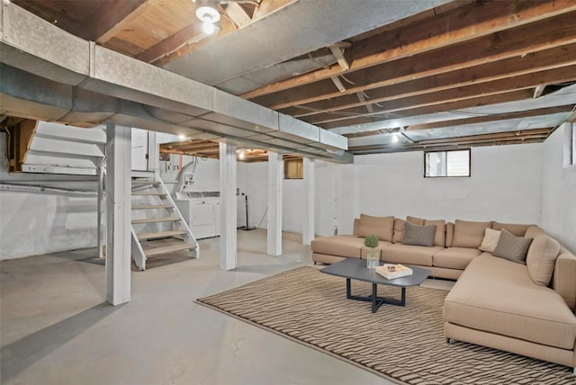 below grade area featuring independent washer and dryer and stairs