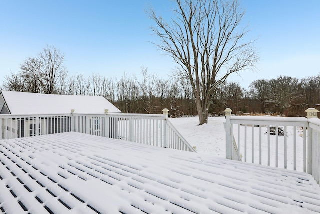 view of snow covered deck