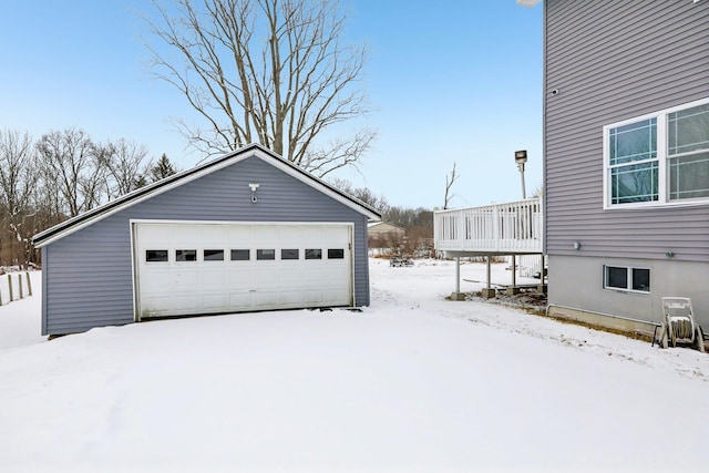 view of snow covered garage