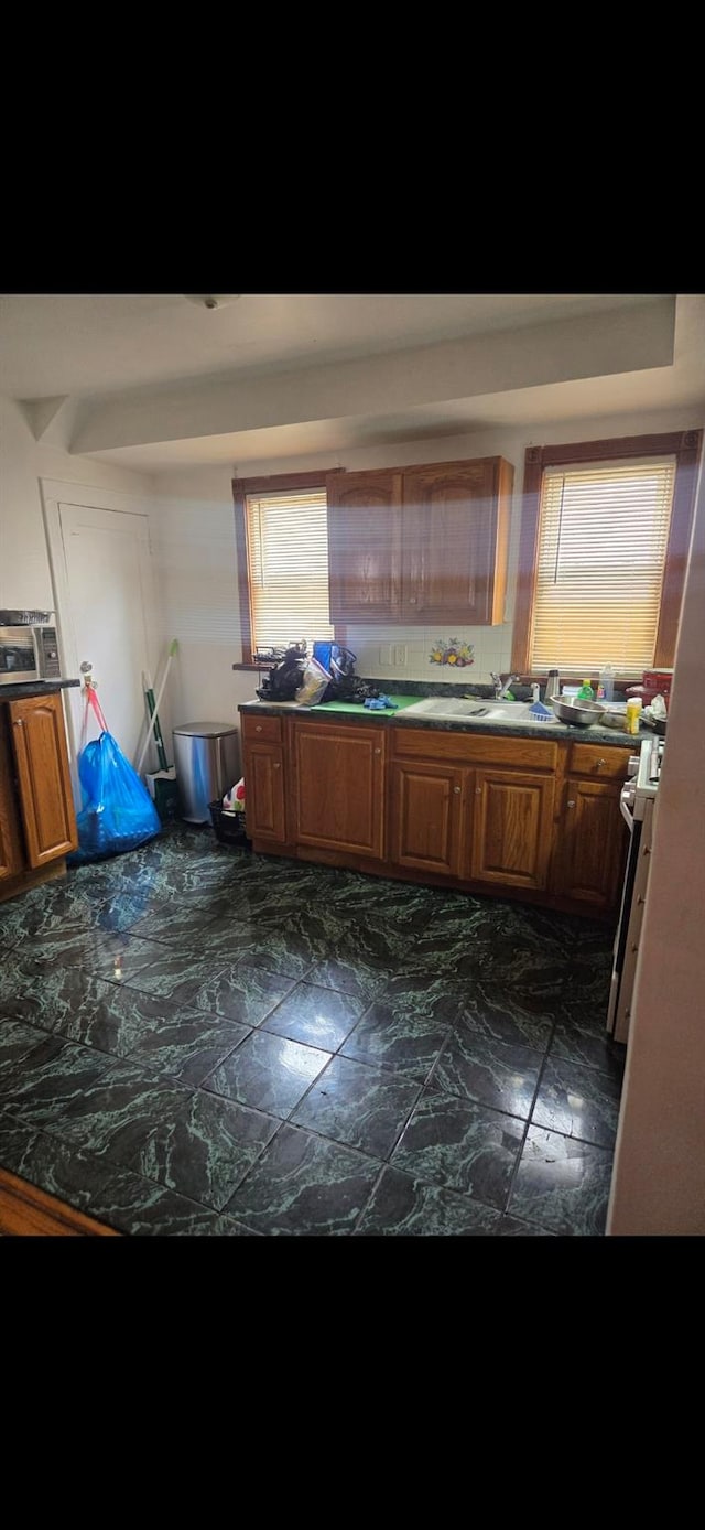 kitchen with stove and sink