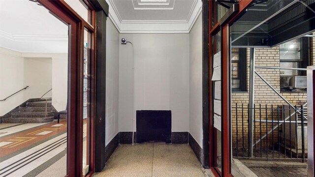3000 Valentine Ave Unit 4E, Bronx, NY 10458 - corridor with baseboards, speckled floor, and crown molding