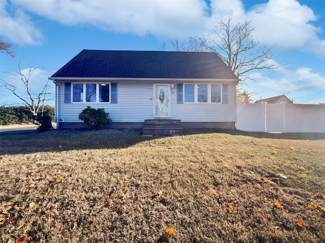 single story home featuring a front yard