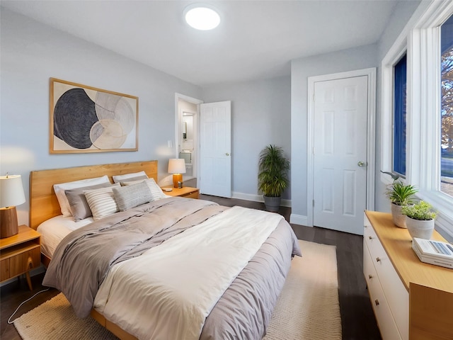 bedroom featuring dark hardwood / wood-style floors