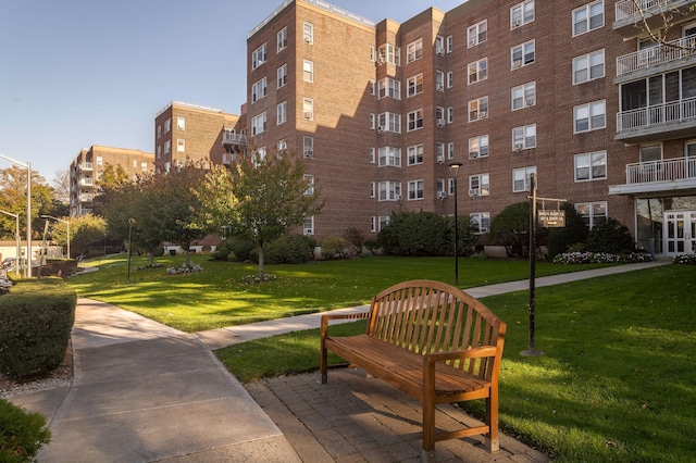 surrounding community featuring a lawn