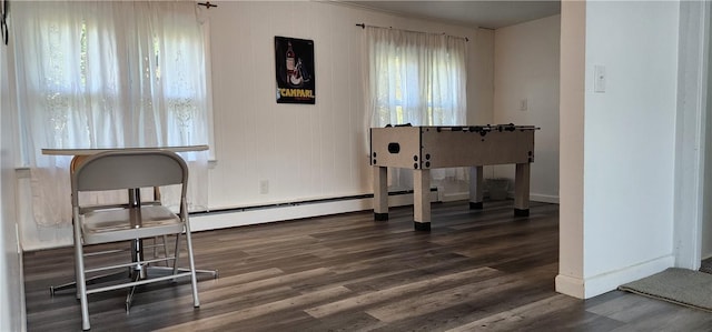 home office with dark wood-type flooring