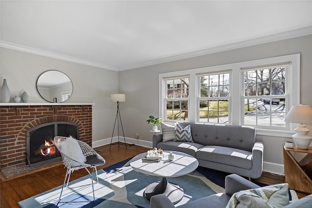 living room with dark hardwood / wood-style flooring, a brick fireplace, and ornamental molding