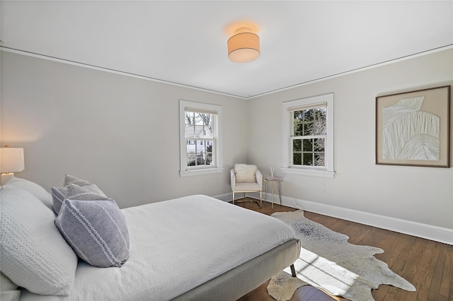 bedroom featuring dark hardwood / wood-style floors