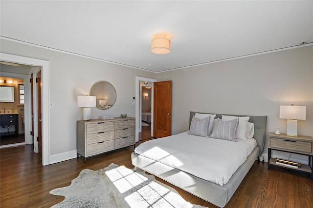 bedroom with dark wood-type flooring