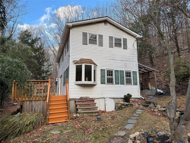 view of front facade with a deck