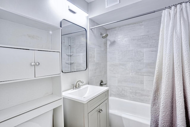 bathroom with vanity and shower / tub combo