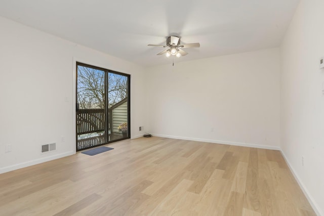 unfurnished room with ceiling fan and light hardwood / wood-style flooring