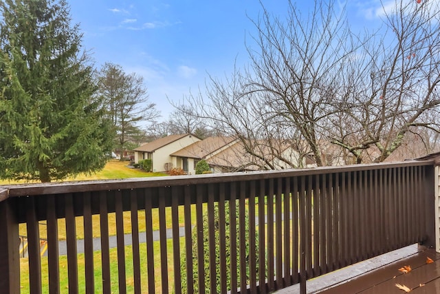 deck featuring a lawn