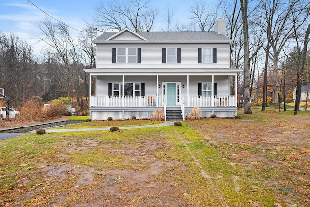 view of front of house with a front lawn