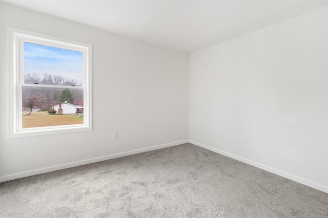 unfurnished room featuring carpet floors