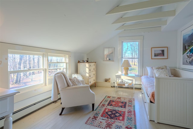 bedroom with lofted ceiling with beams, light hardwood / wood-style flooring, and multiple windows