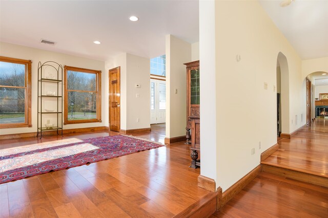 foyer entrance with hardwood / wood-style floors