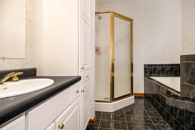 bathroom with vanity, separate shower and tub, and tile patterned floors