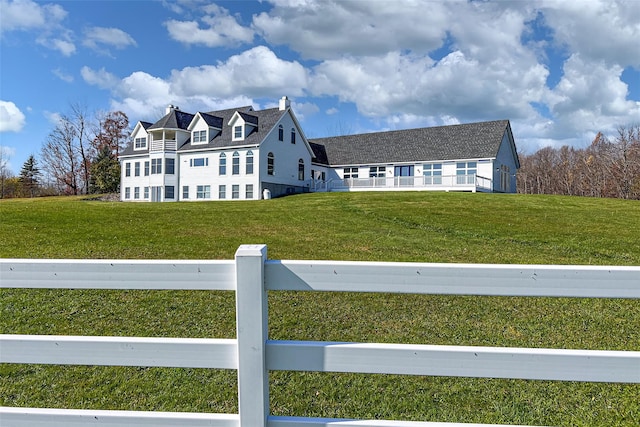 view of front of home with a front lawn