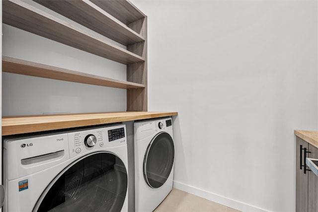 laundry area featuring separate washer and dryer