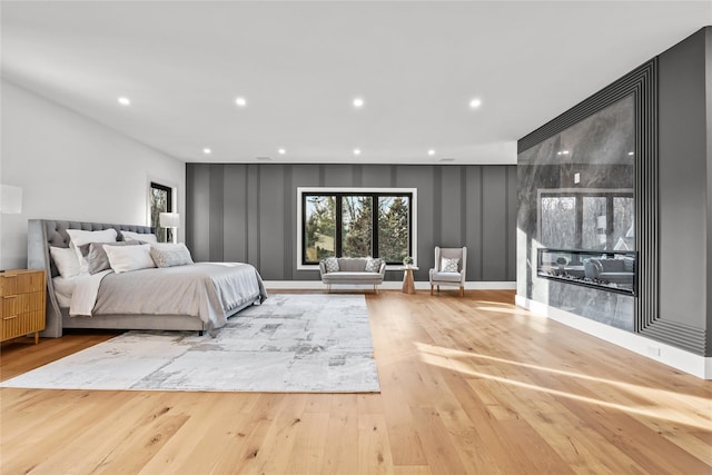 bedroom with hardwood / wood-style flooring