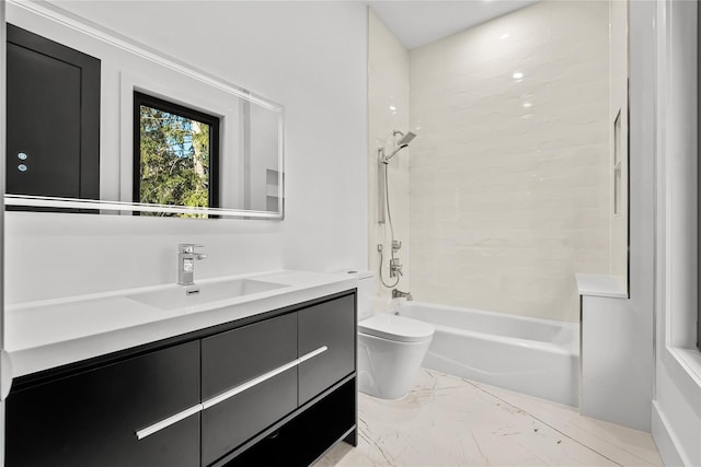 full bathroom featuring vanity, toilet, and tiled shower / bath