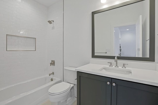 full bathroom with washtub / shower combination, vanity, and toilet