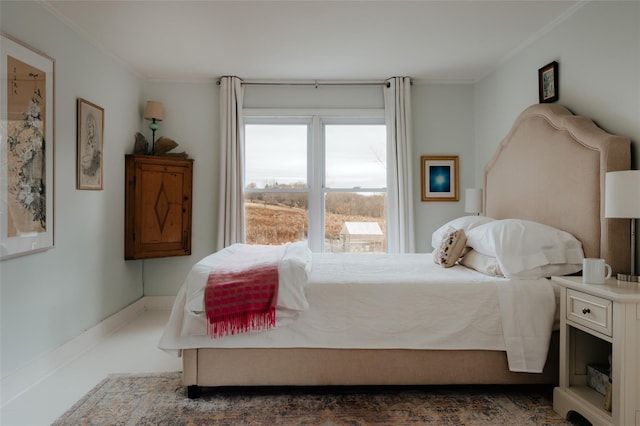 bedroom with ornamental molding