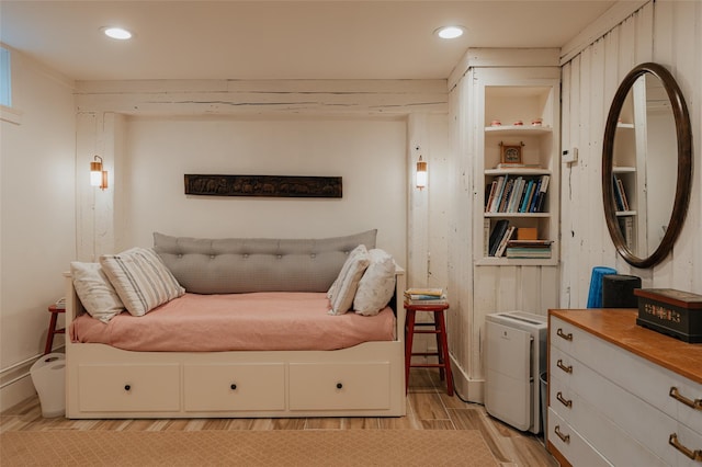 bedroom with light hardwood / wood-style flooring