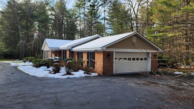 view of home's exterior with a garage