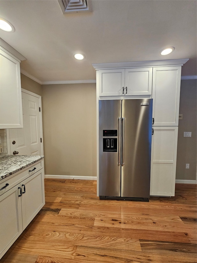 kitchen featuring white cabinetry