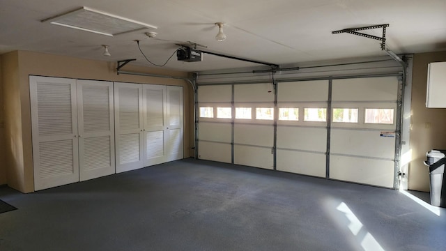 garage featuring a garage door opener