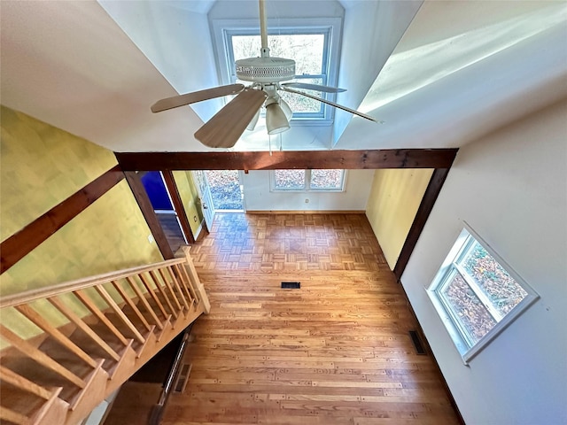 additional living space with ceiling fan, vaulted ceiling, and hardwood / wood-style flooring