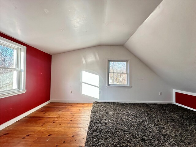 6 Hemlock Rd, South Salem, NY 10590 - additional living space featuring vaulted ceiling, baseboards, and hardwood / wood-style floors