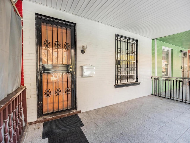 entrance to property with a porch